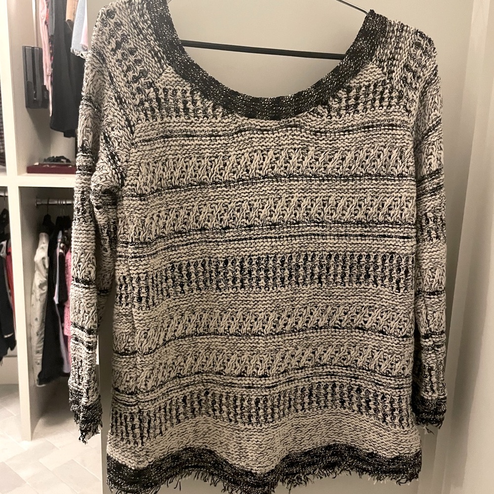 Chanel-like Zara sweater with split open back.